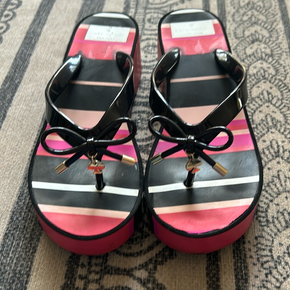 Super cute Kate Spade wedge sandals. With gold emblem.💗Size 7.